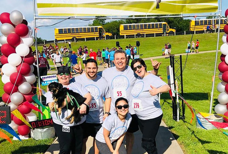 Team members at charity race event