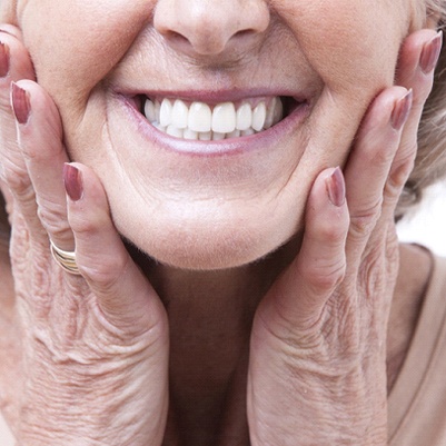 Woman smiling with dentures in Carrollton