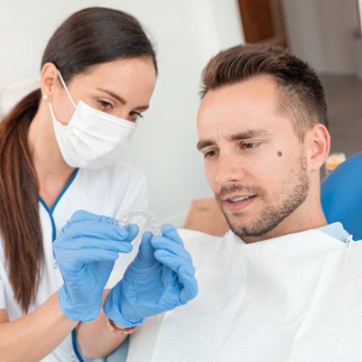 Man at the dentist getting SureSmile